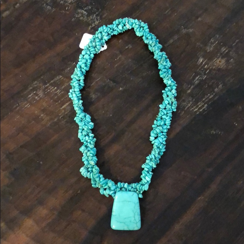 Turquoise stone necklace.
